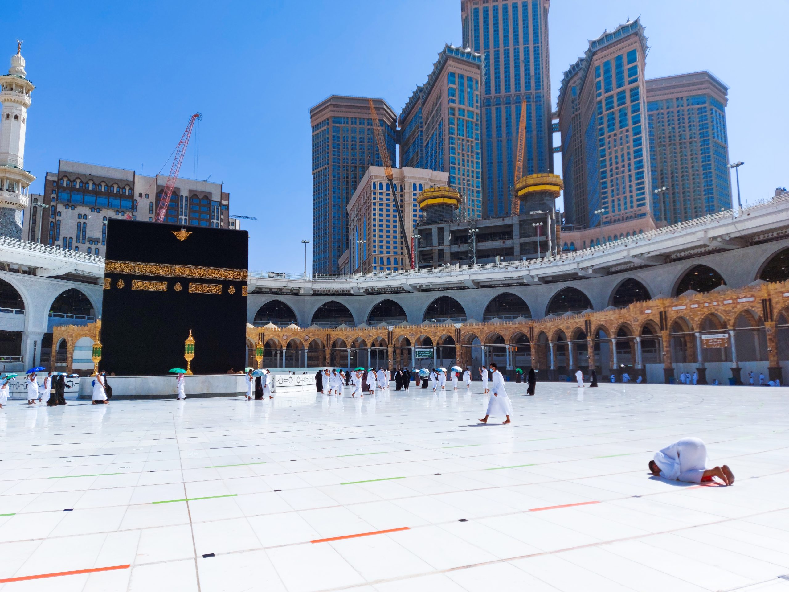 People around kabba performing Step by Step Umrah